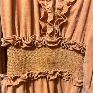 Beautiful Rust colored dress. Fits perfectly and perfect for Fall!